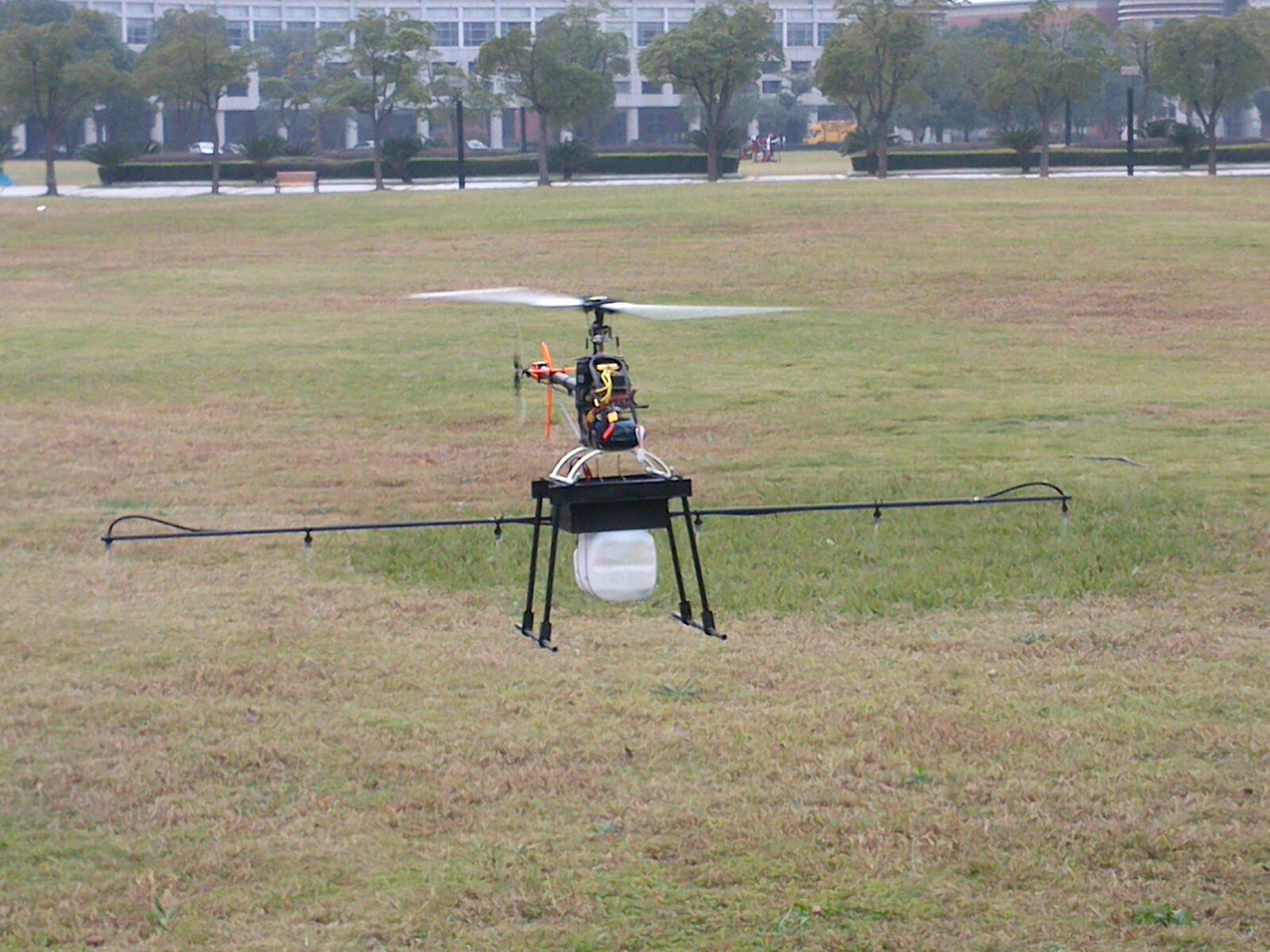Closeup of the airframe, spray boom, and tank