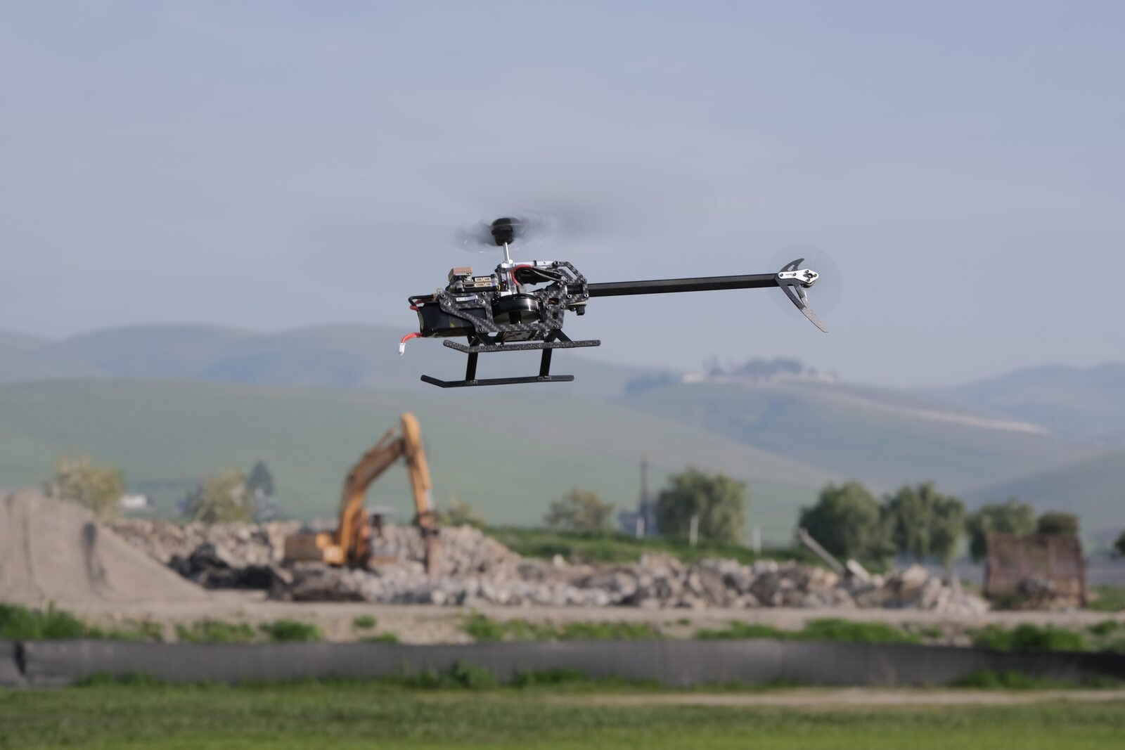 Swashplateless helicopter hovering at the test site